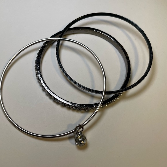 Three Elegant Silver Tone and Crystal Bangle Stacking Bracelets - Picture 3 of 6